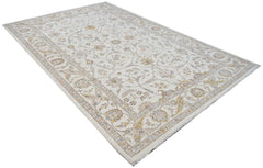 An Afghan Chobi rug featuring a traditional floral pattern in soft, earthy tones on a cream base.