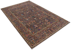 An Afghan Chobi rug featuring a traditional floral pattern in earthy tones on a brown background.