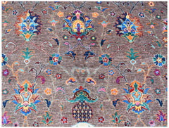 An Afghan Chobi rug featuring a traditional floral pattern in vibrant colors on a brown background.