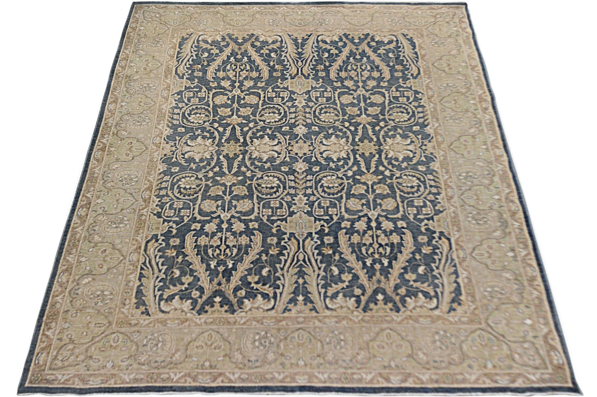 A rectangular Afghan Chobi rug featuring a dark blue field with intricate beige floral patterns.