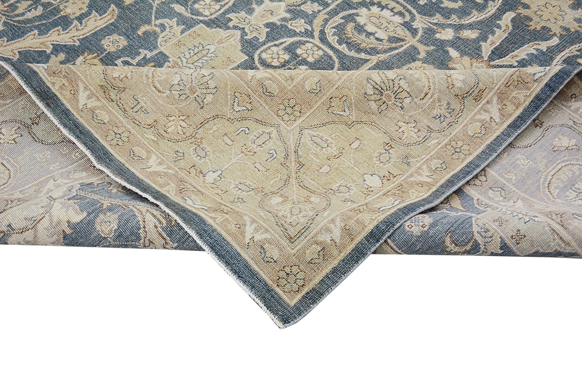 A handmade Afghan Chobi rug featuring a traditional floral pattern in shades of blue and beige.
