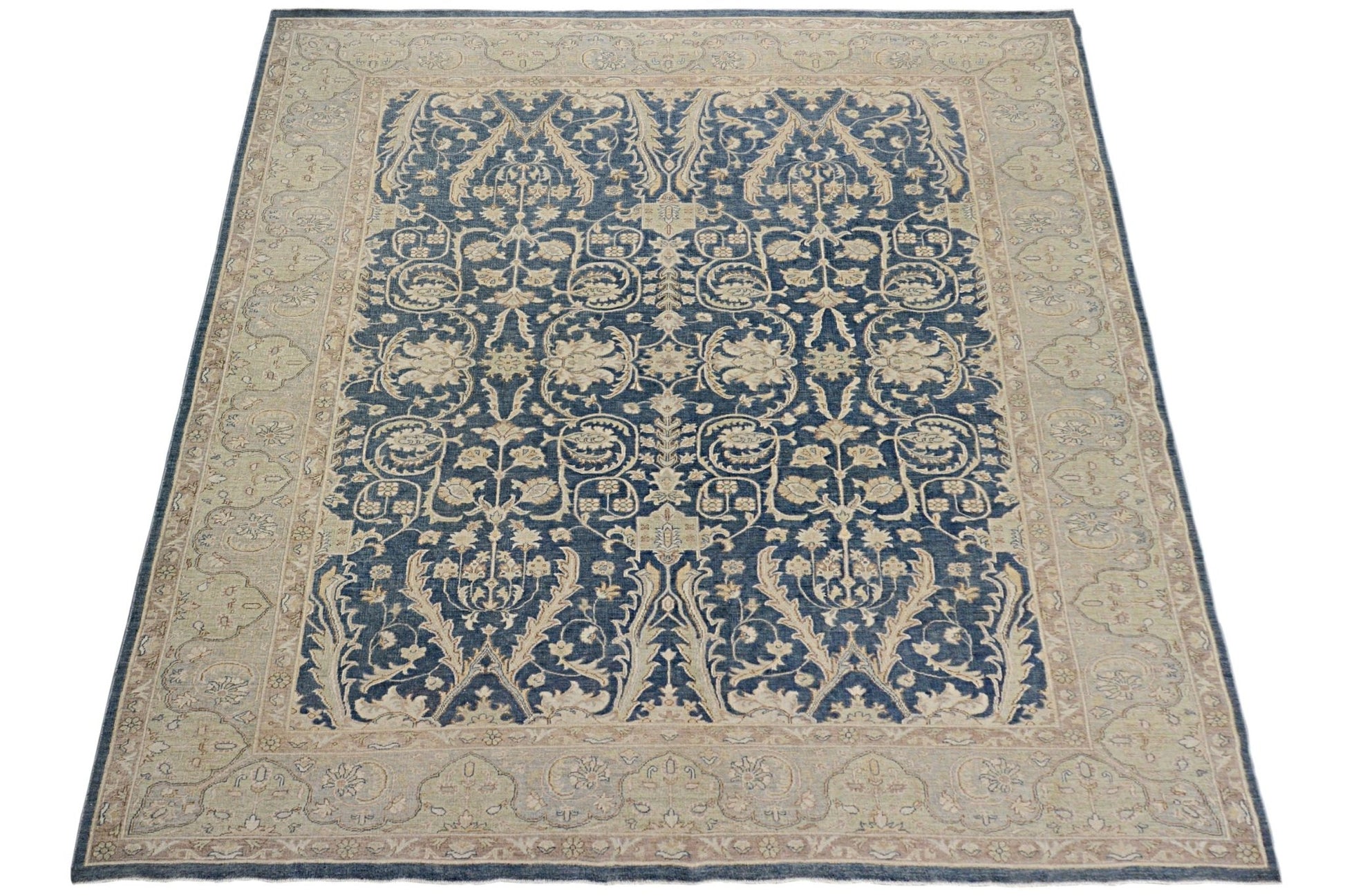 A rectangular Afghan Chobi rug featuring a traditional floral pattern in blue and beige tones.