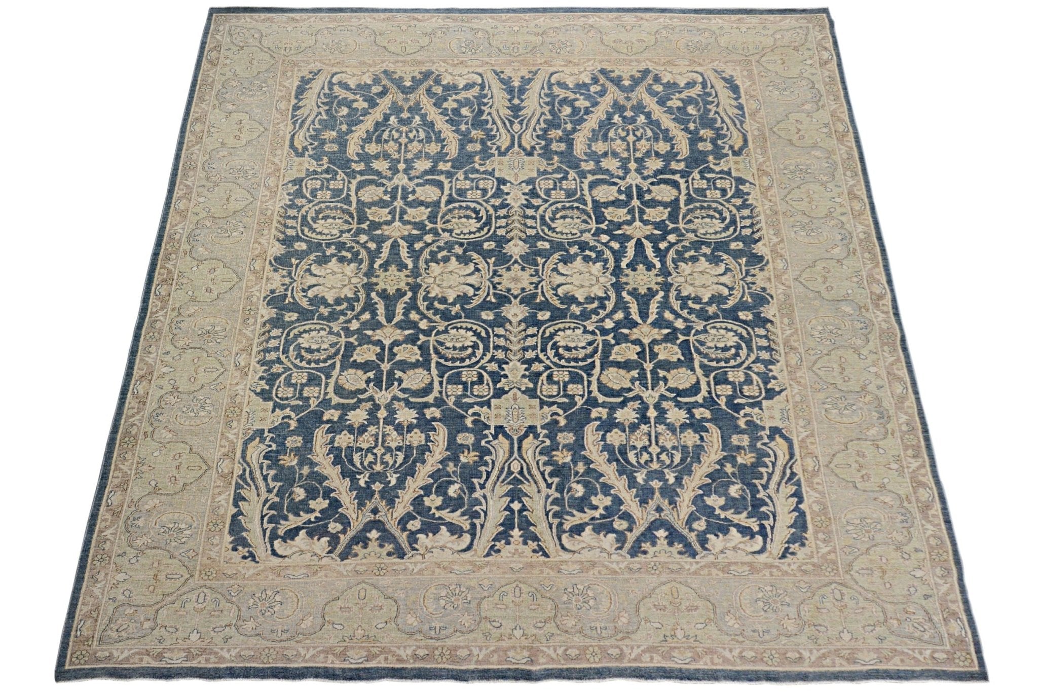 A rectangular Afghan Chobi rug featuring a traditional floral pattern in blue and beige tones.