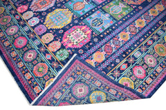 A vibrant, handwoven Afghan Chobi rug featuring intricate geometric patterns in a colorful palette.