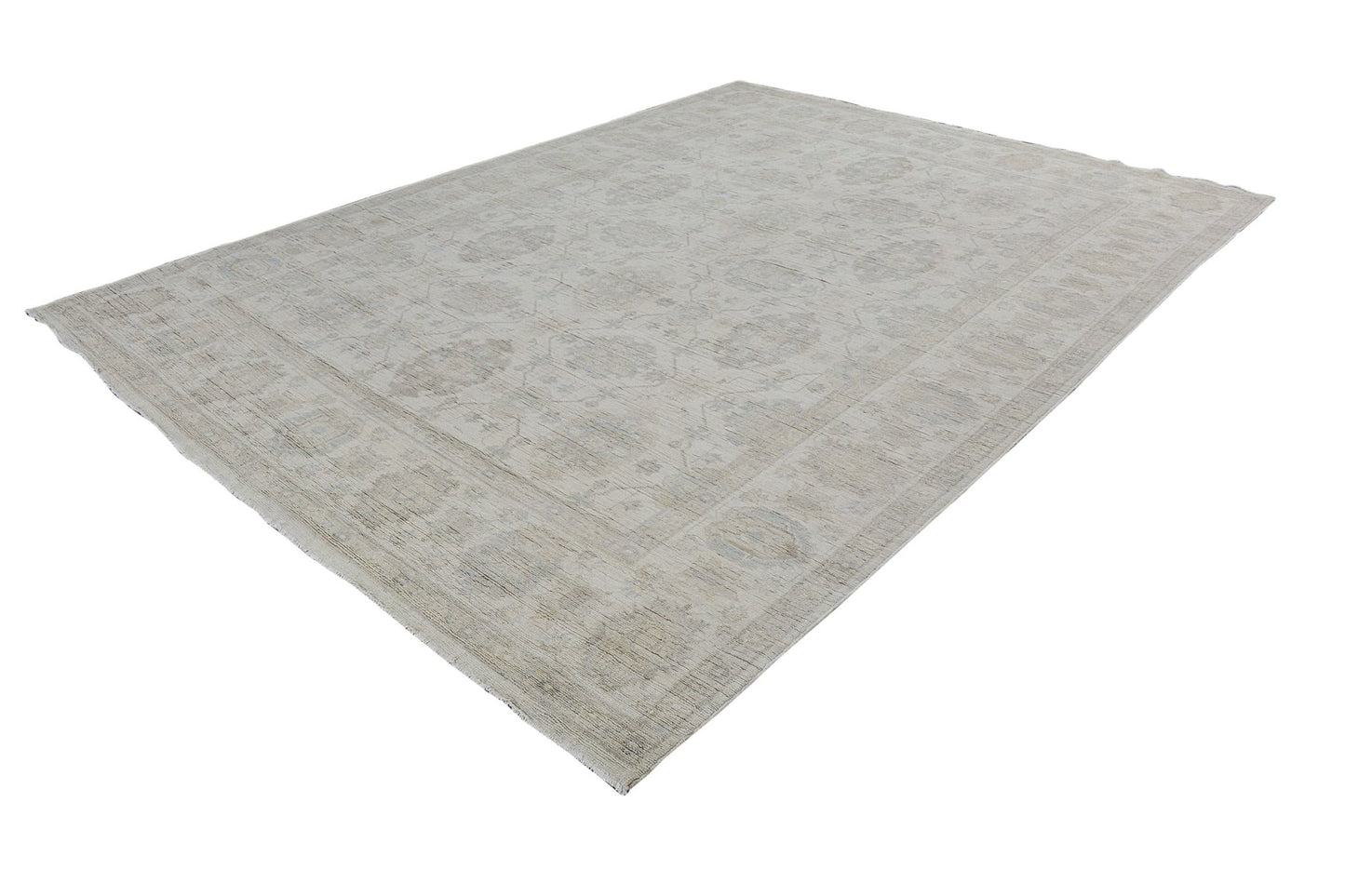 A handmade Afghan Chobi rug featuring a traditional floral pattern in neutral beige tones.