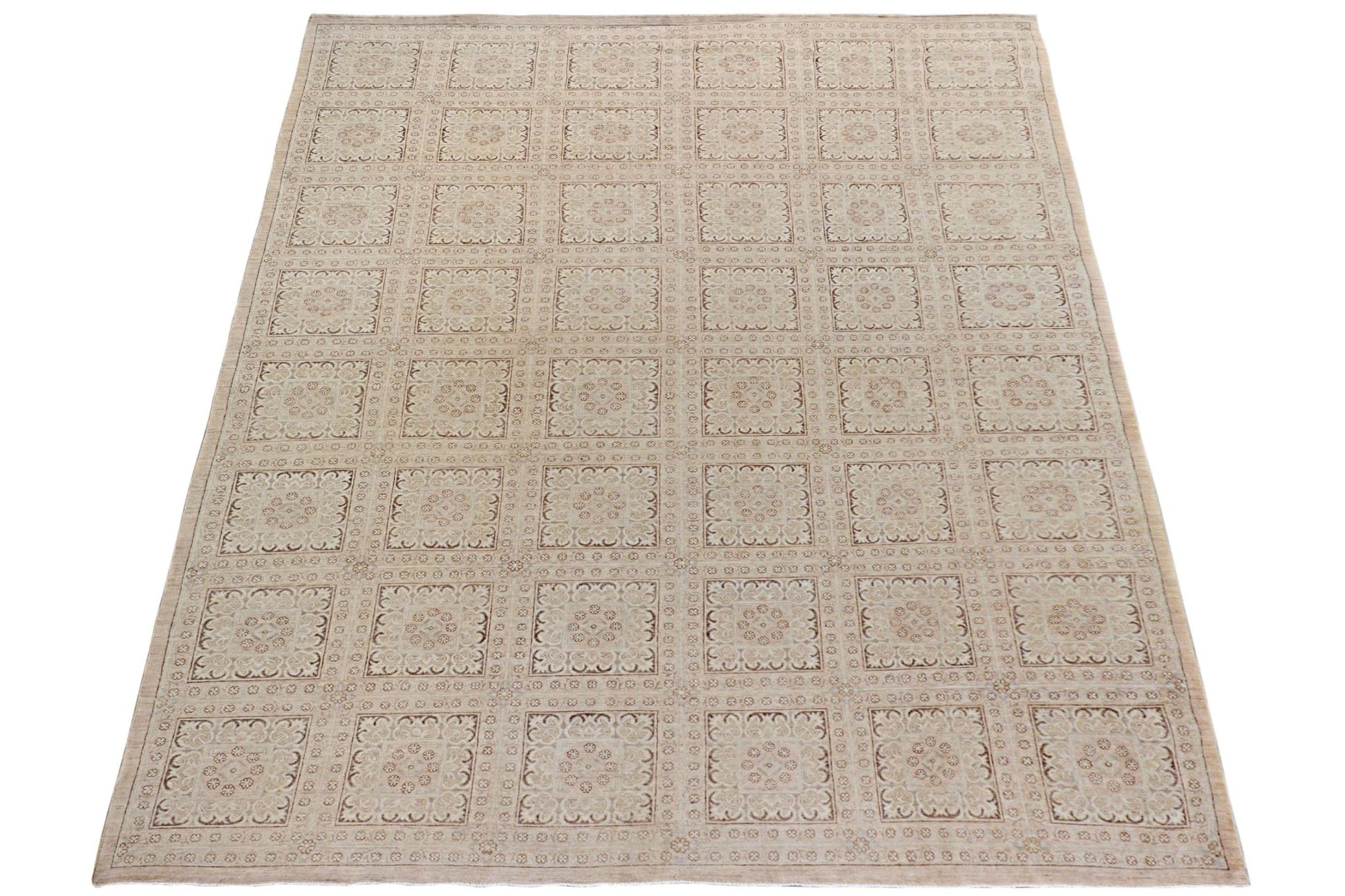 An Afghan Chobi rug featuring a repeating grid of intricate floral squares in neutral wood tones.