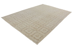 An Afghan Chobi rug featuring a repeating square pattern in neutral beige and cream tones.