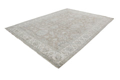 An Afghan Chobi rug featuring a traditional floral pattern in neutral beige and cream tones.