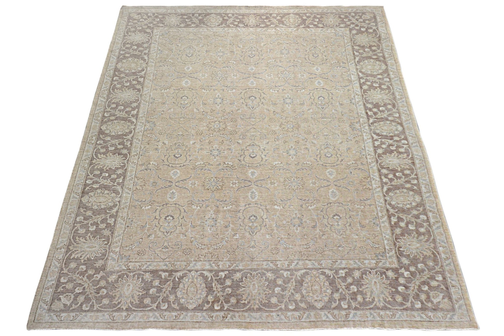 A rectangular Afghan Chobi rug featuring a traditional floral pattern in beige and brown tones.