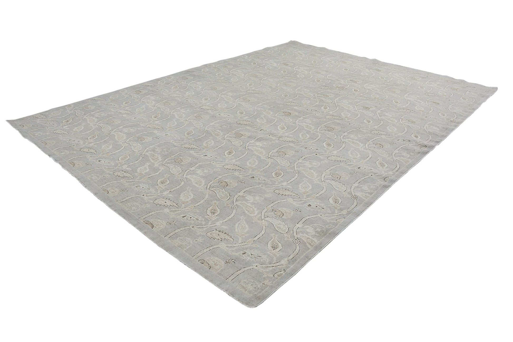 A handmade Afghan Chobi rug featuring a traditional floral vine pattern in soft neutral tones.
