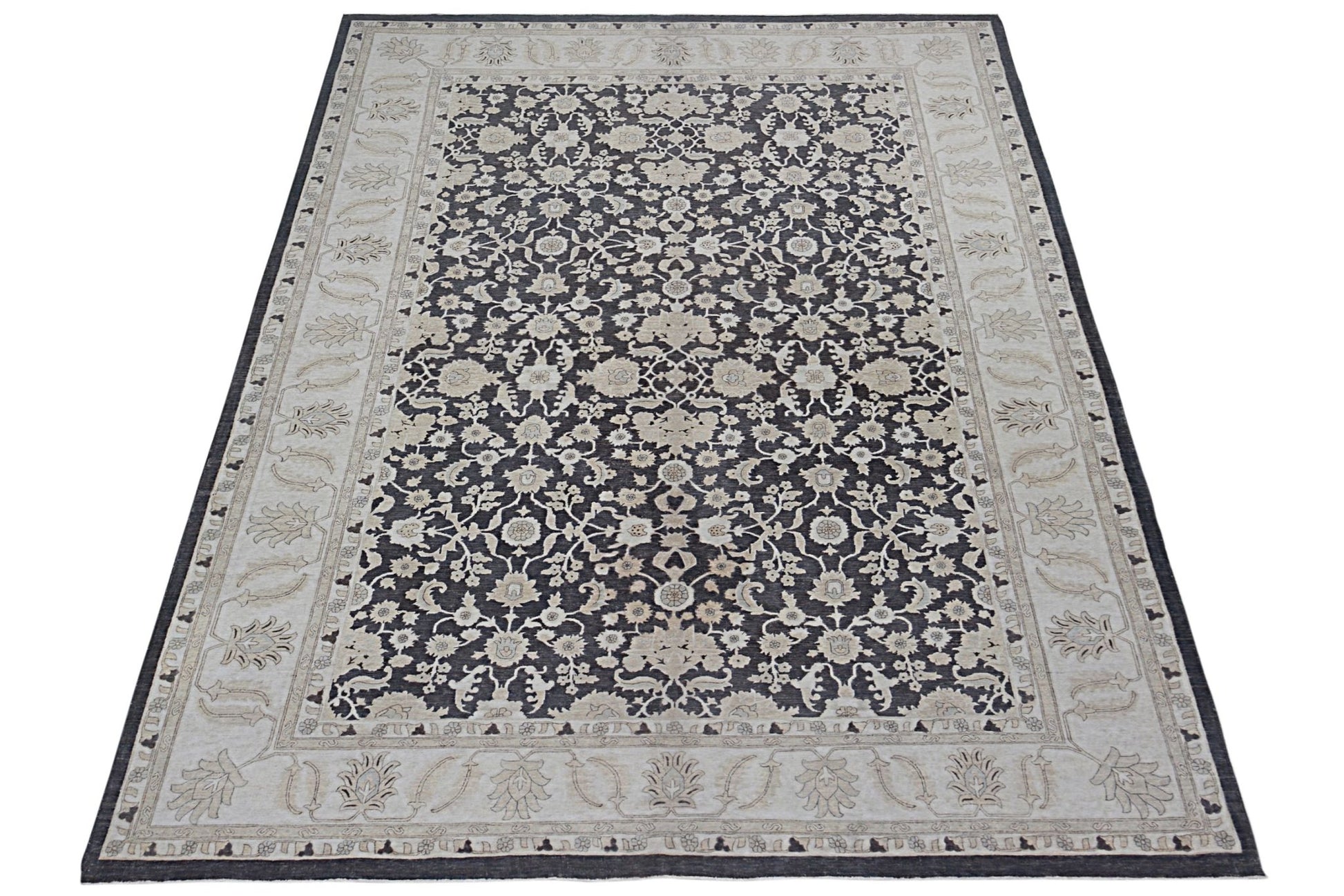 A rectangular Afghan Chobi rug featuring a dark field with intricate floral patterns and light borders.