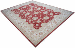 An Afghan Chobi rug featuring a red field with intricate floral patterns and a cream border.