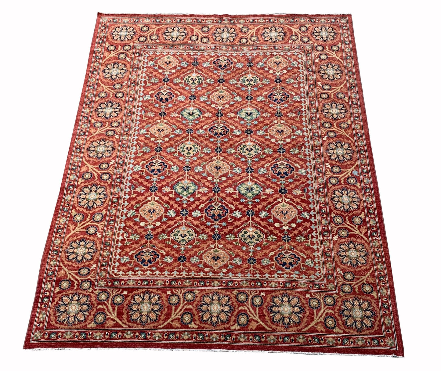 Handmade Afghan Chobi rug featuring a traditional floral pattern in shades of red and beige.