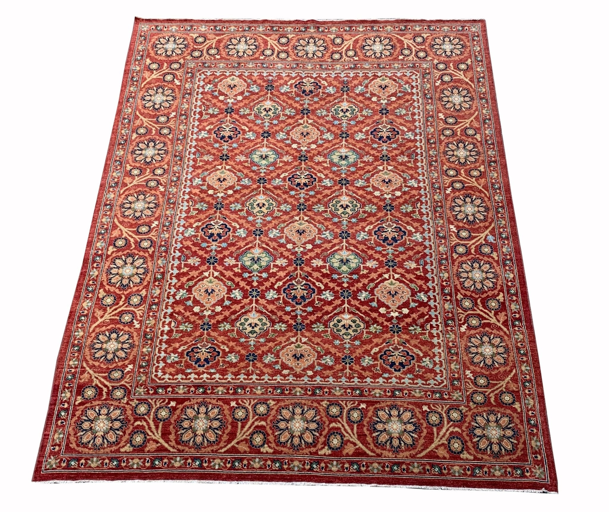 Handmade Afghan Chobi rug featuring a traditional floral pattern in shades of red and beige.