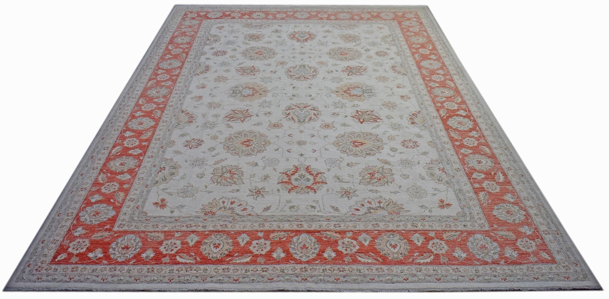 A rectangular Afghan Chobi rug featuring a floral pattern in muted tones with a wide orange border.