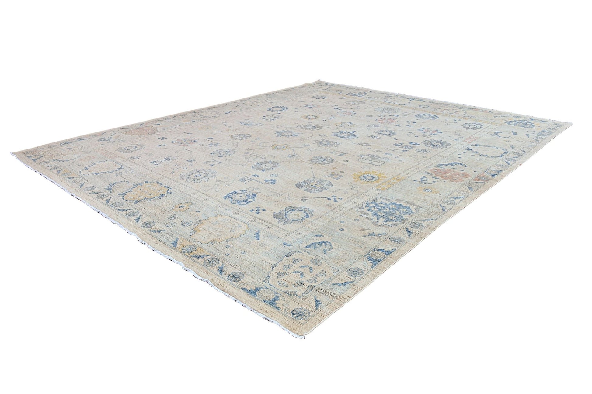 An Afghan Chobi rug featuring a traditional floral pattern in muted blue and beige tones.