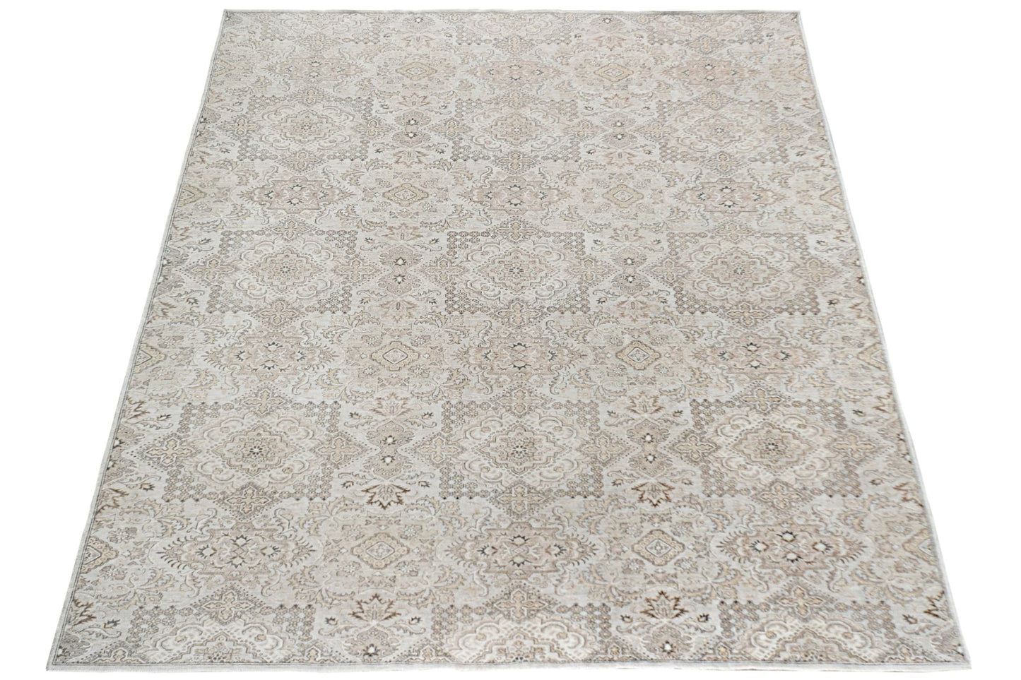 An Afghan Chobi rug featuring a traditional intricate pattern in neutral beige and brown tones.