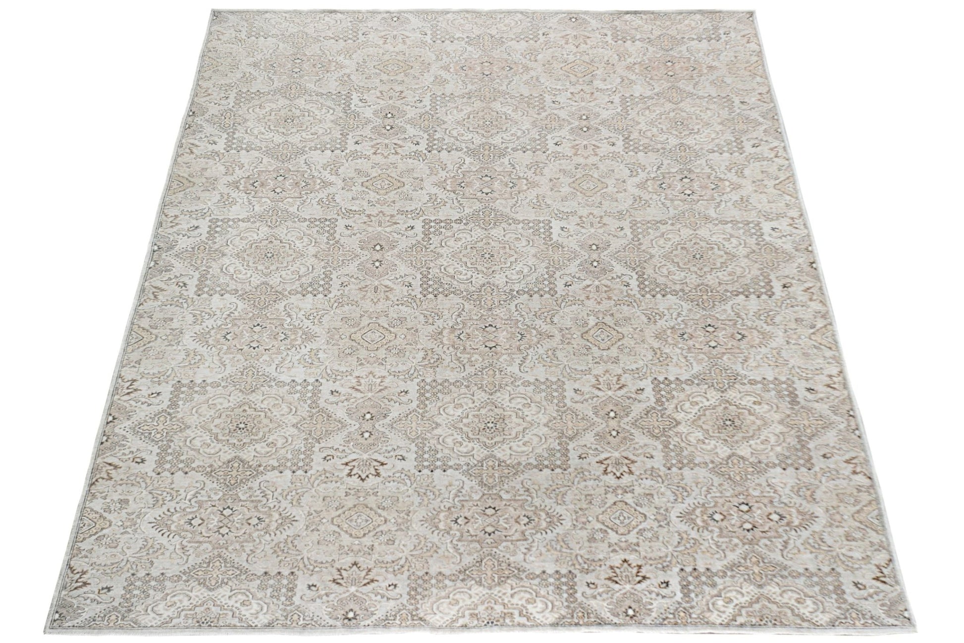An Afghan Chobi rug featuring a traditional intricate pattern in neutral beige and brown tones.
