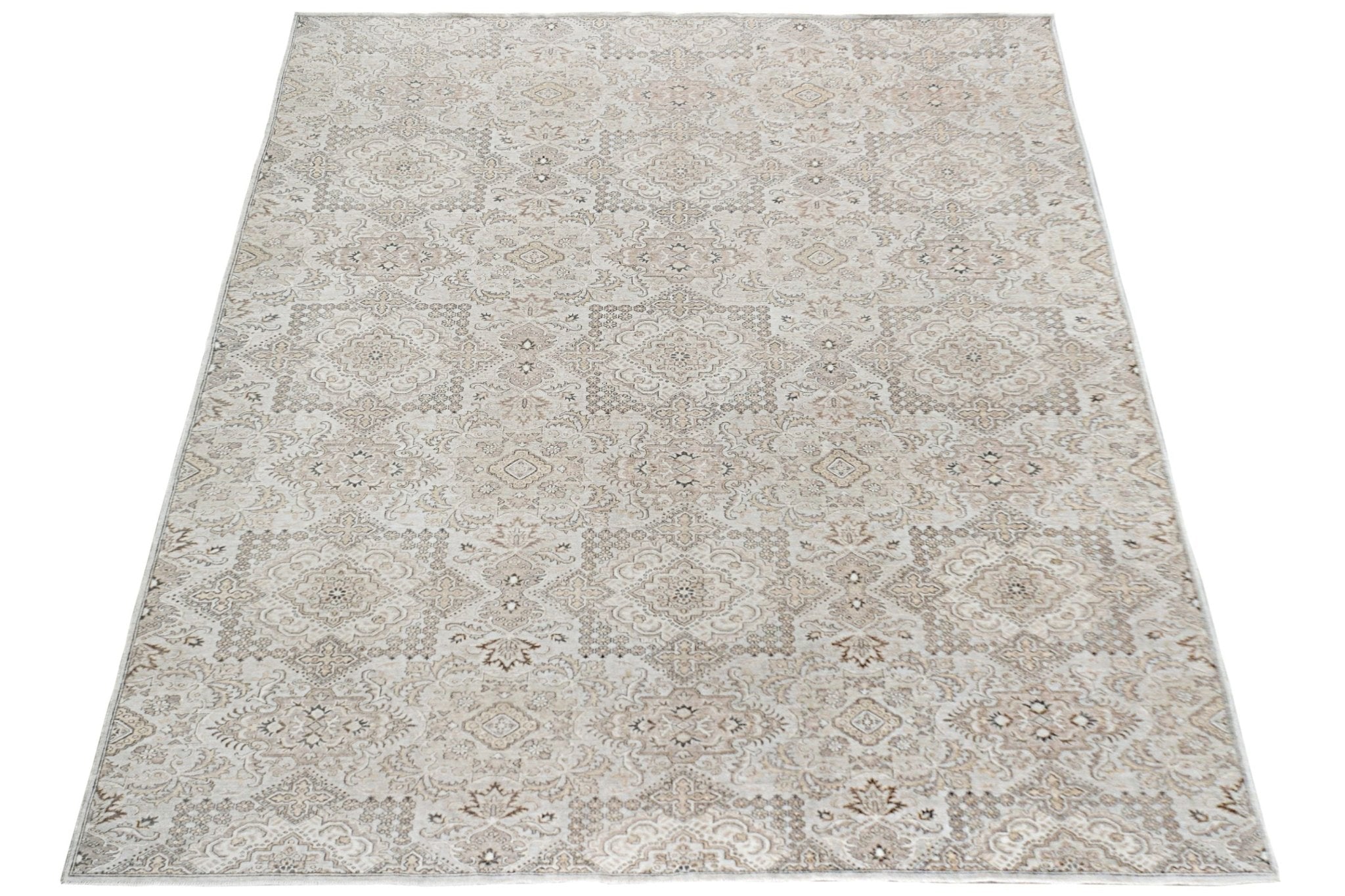 An Afghan Chobi rug featuring a traditional intricate pattern in neutral beige and brown tones.