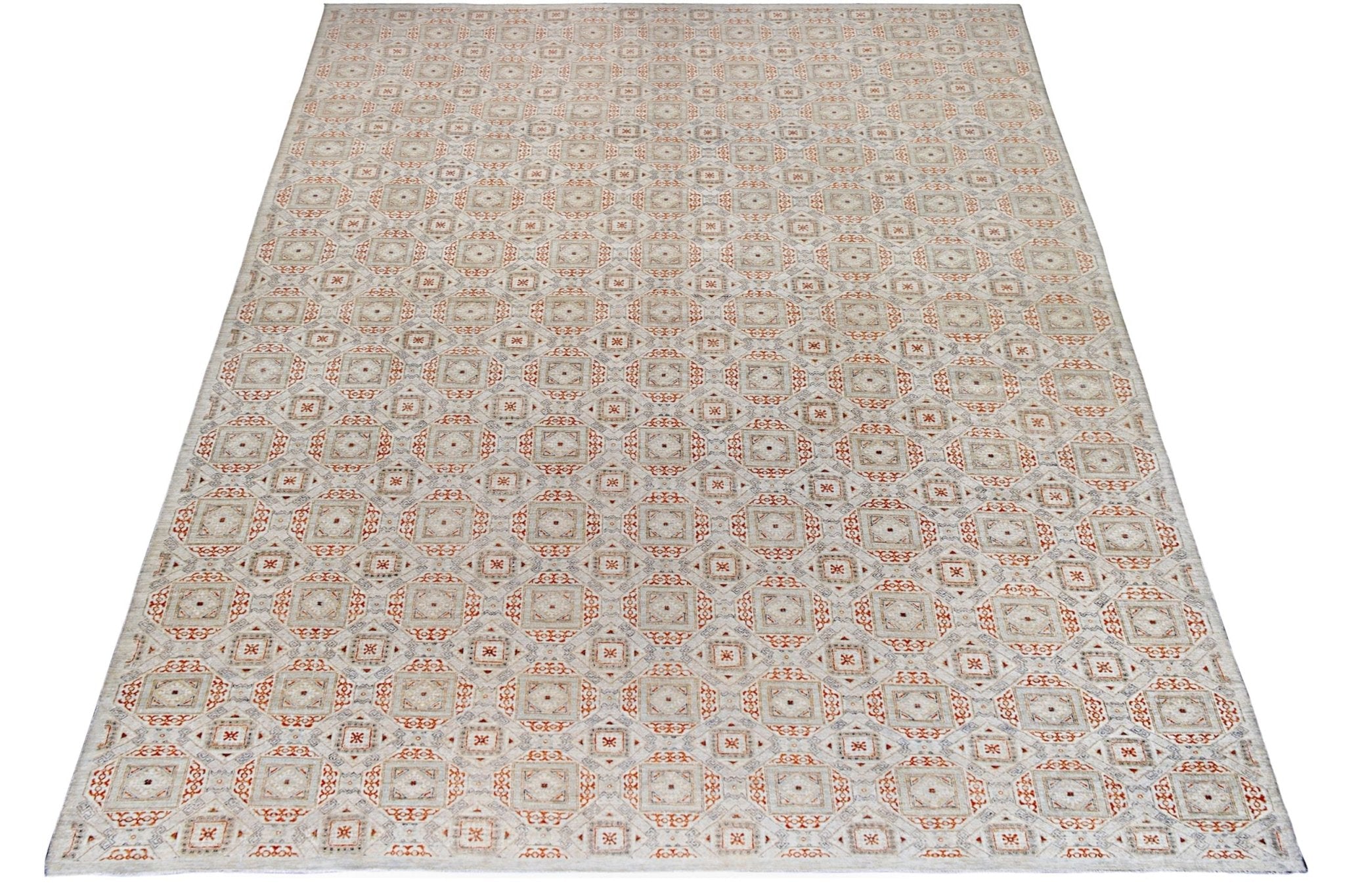 An Afghan Chobi rug featuring a repeating geometric pattern in earthy tones on a light background.