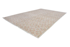 An Afghan Chobi rug featuring a repeating geometric pattern in soft wood tones.