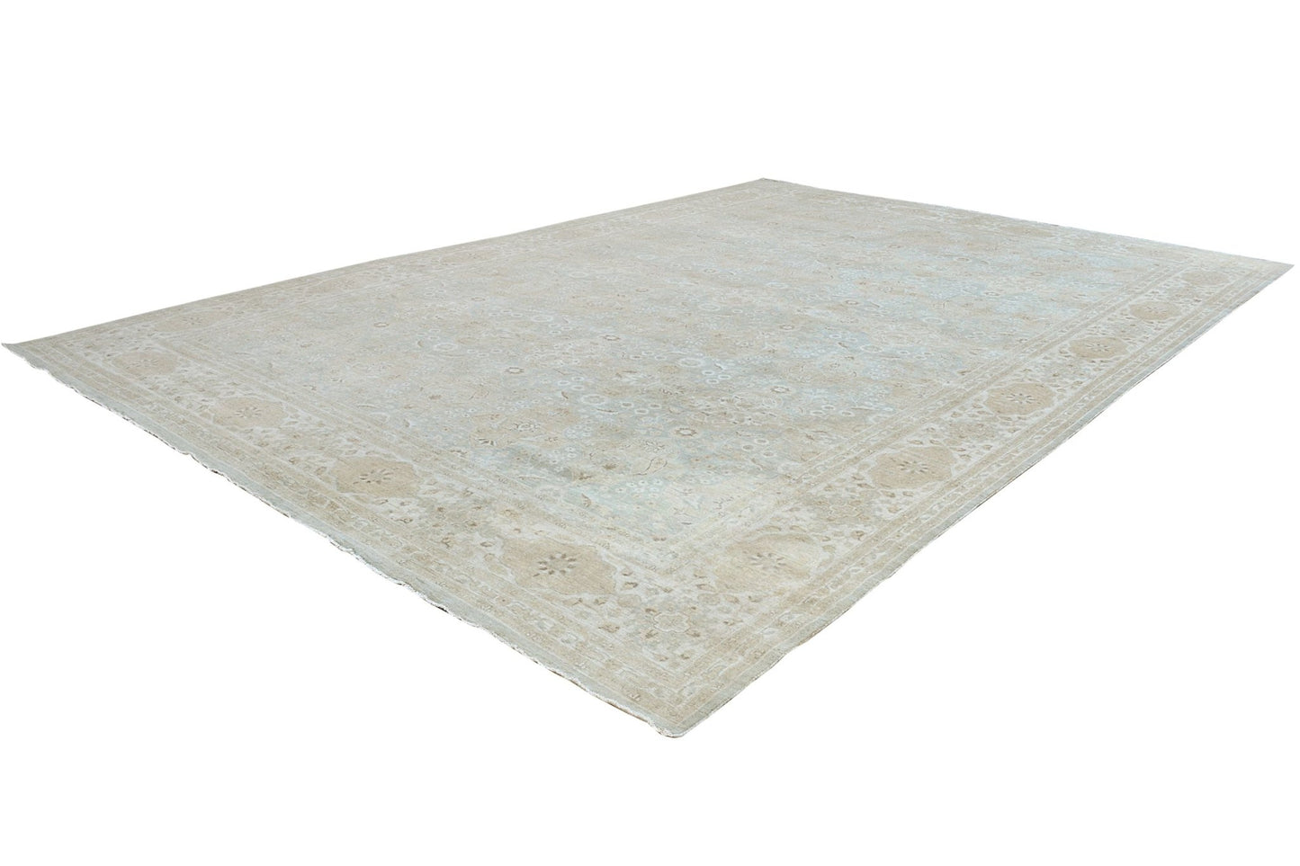 An Afghan Chobi rug featuring a traditional floral pattern in soft beige and light blue tones.
