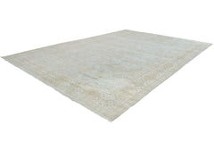 An Afghan Chobi rug featuring a traditional floral pattern in soft beige and light blue tones.