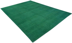 A rectangular, handwoven Afghan Chobi rug in a solid, vibrant overdyed green finish.