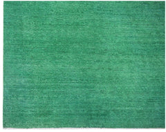 A rectangular, handwoven Afghan Chobi rug featuring a solid, overdyed vibrant green finish.