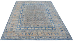 Handmade Afghan Chobi rug featuring a Pazyryk pattern with blue and beige geometric motifs.