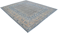 A handmade Afghan Chobi rug featuring a blue and beige Pazyryk pattern with animal motifs.