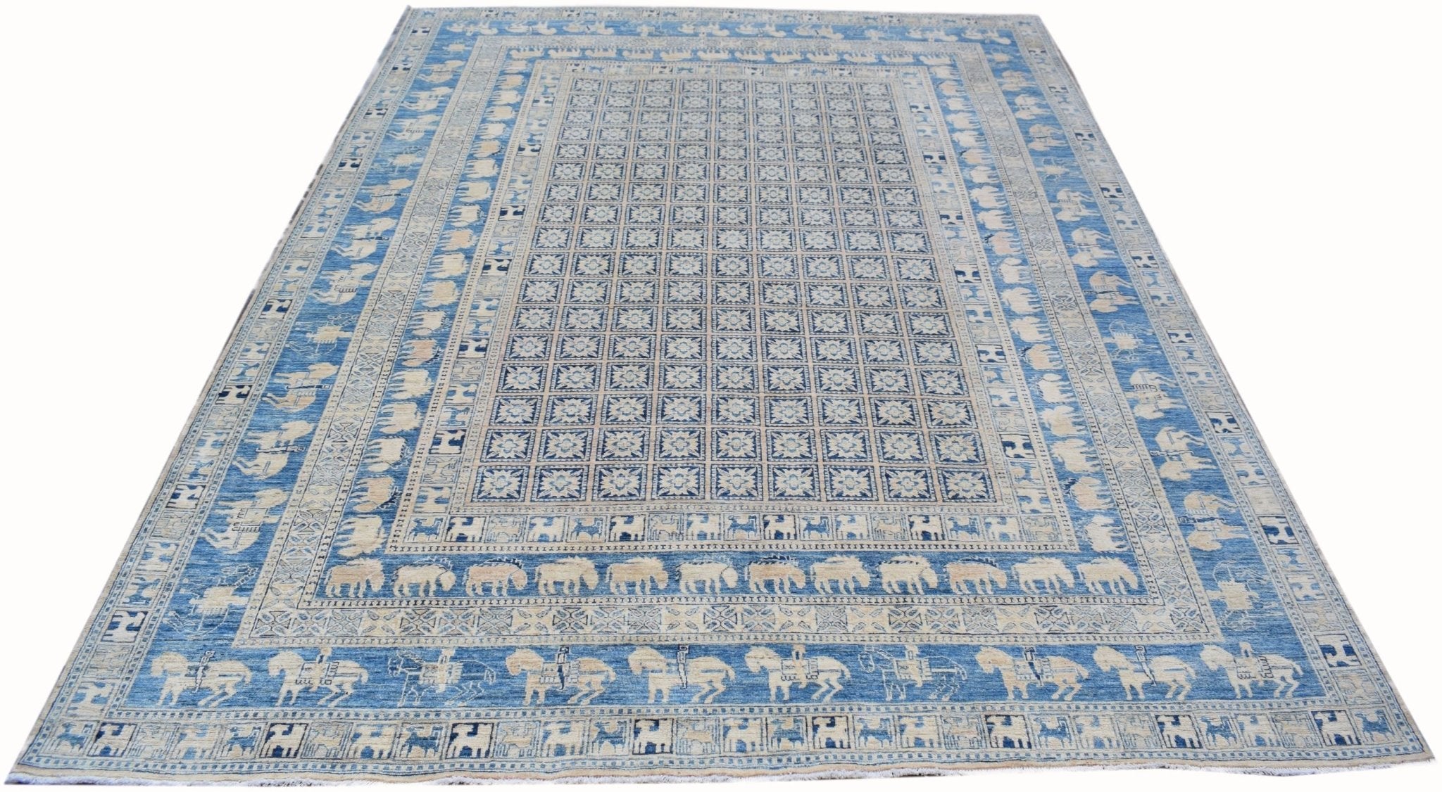 An Afghan Chobi rug featuring a blue field with a grid of floral motifs and animal border patterns.