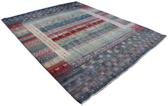 A handmade Afghan Chobi rug featuring a multi-colored striped pattern with traditional motifs.