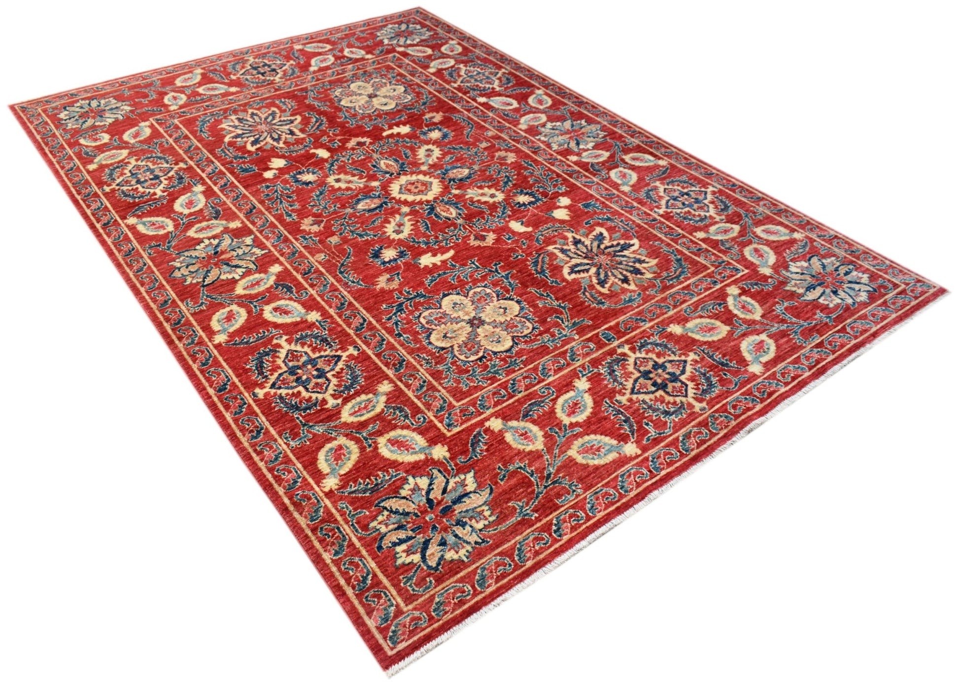 A rectangular Afghan Chobi rug featuring a traditional red field with intricate blue floral motifs.