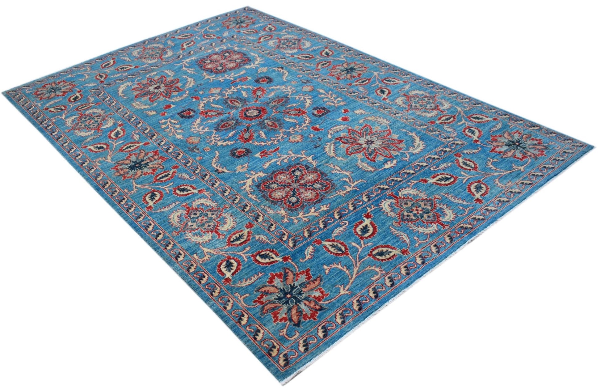A rectangular Afghan Chobi rug featuring a blue field with traditional red and cream floral motifs.