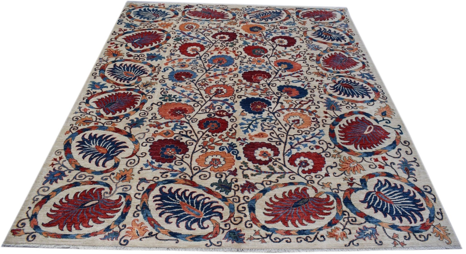 An Afghan Chobi rug featuring a traditional floral Suzani pattern in red, blue, and orange tones.