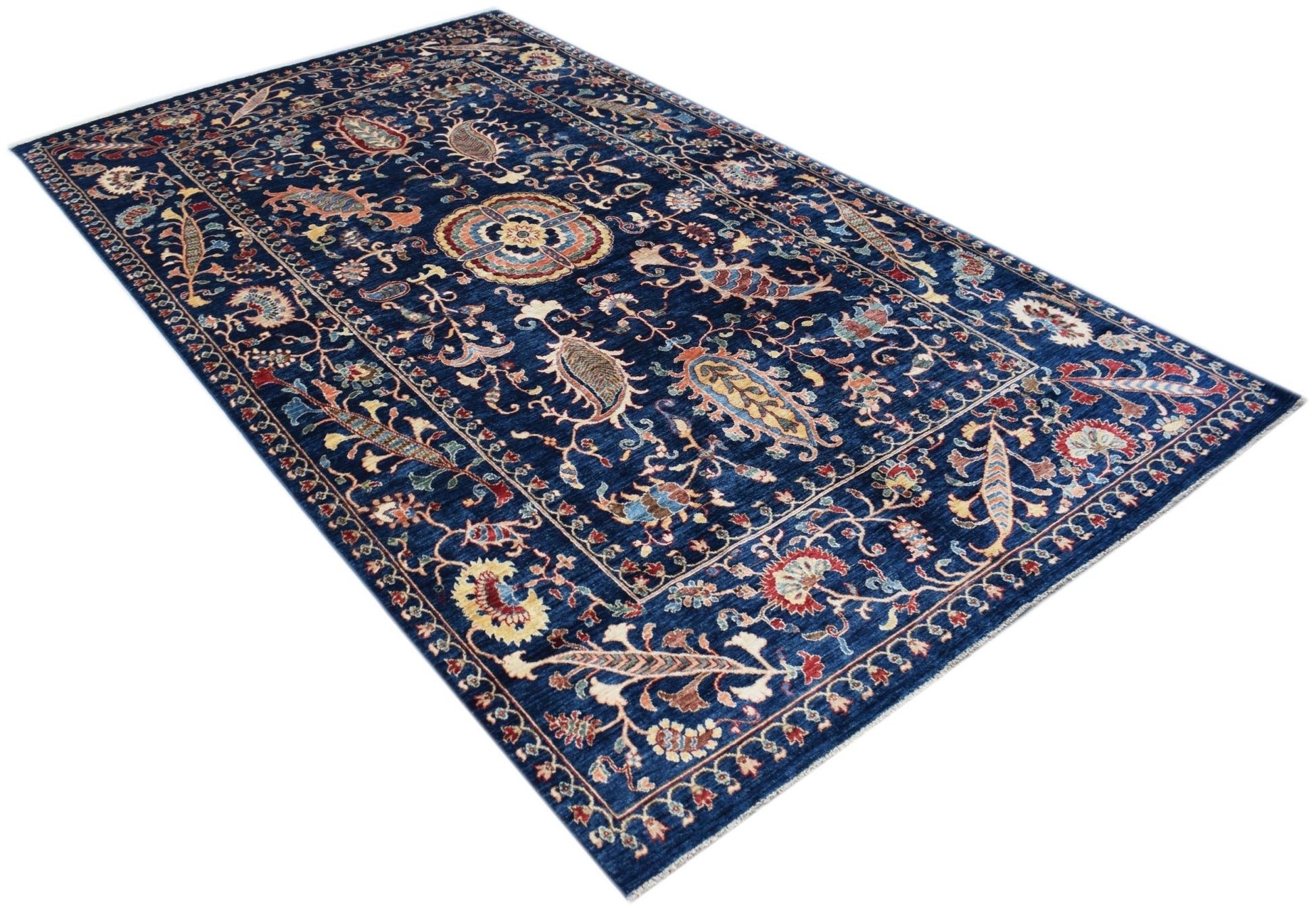 A rectangular Afghan Chobi rug featuring a traditional floral pattern in shades of blue and red.