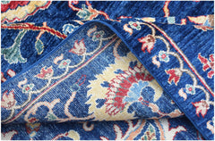 A handmade Afghan Chobi rug featuring a traditional floral pattern in blue, red, and yellow tones.