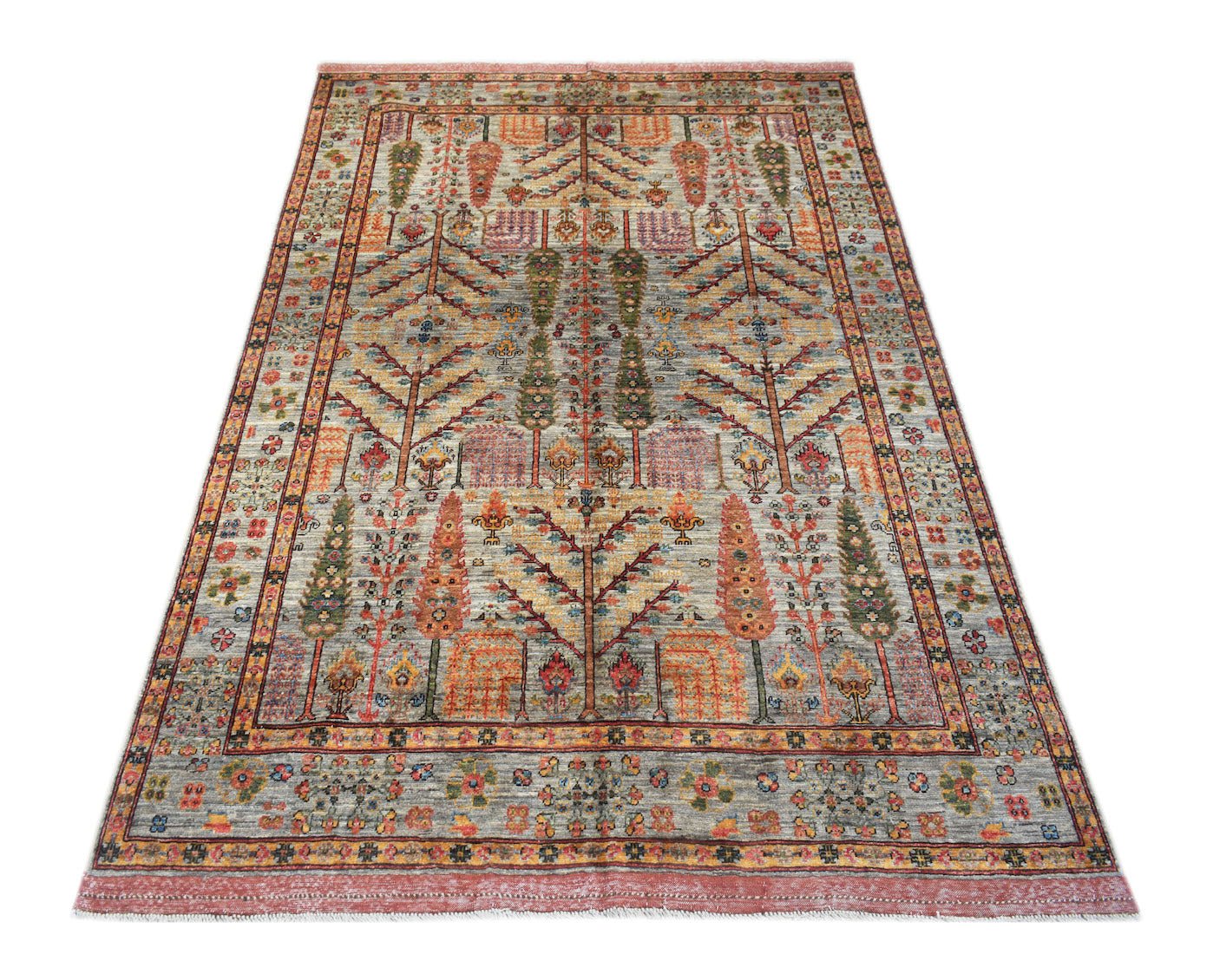 Handwoven Afghan Chobi rug featuring a traditional Tree of Life pattern in earthy tones.