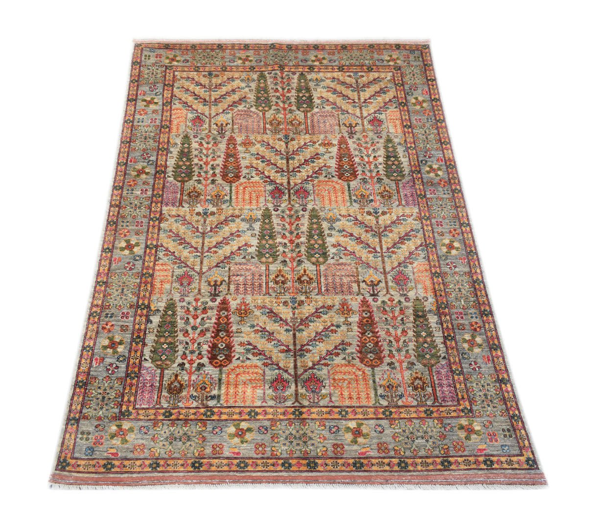 Handwoven Afghan Chobi rug featuring a traditional Tree of Life pattern in earthy tones.