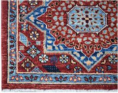 A handmade Afghan Chobi runner featuring a detailed Mamluk medallion pattern in red and blue.