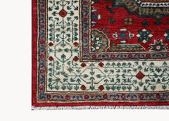 A handmade Afghan Chobi runner featuring a traditional Mamluk pattern in red, blue, and cream.