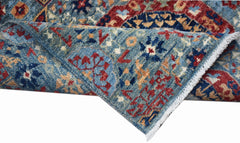 A handwoven Afghan Chobi runner featuring a traditional blue Mamluk pattern with red accents.