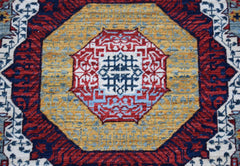 A handwoven Afghan Chobi runner featuring a detailed geometric Mamluk medallion in red and blue.