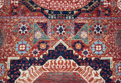 A handwoven Afghan Chobi runner featuring a detailed Mamluk geometric medallion pattern.