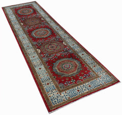 A handmade Afghan Chobi runner featuring a red field with intricate Mamluk medallion patterns.