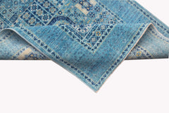 A handmade Afghan Chobi runner rug featuring a blue Mamluk pattern with intricate geometric details.