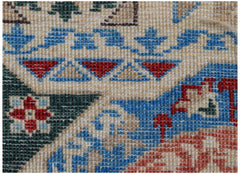 A close-up view of a handmade Afghan Chobi runner featuring intricate geometric Mamluk patterns.