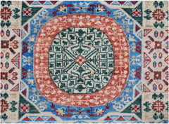 A handmade Afghan Chobi runner featuring a geometric Mamluk medallion in red, blue, and green.