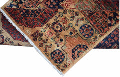 A handmade Afghan Chobi runner featuring a traditional Mamluk medallion pattern in warm tones.
